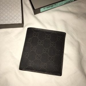 AUTHENTIC GUCCI MEN’S BIFOLD WALLET